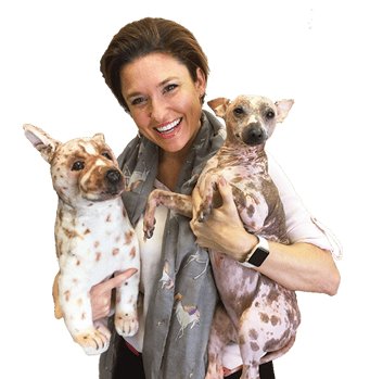 Dr. Dani holding dog and Petsies plush dog